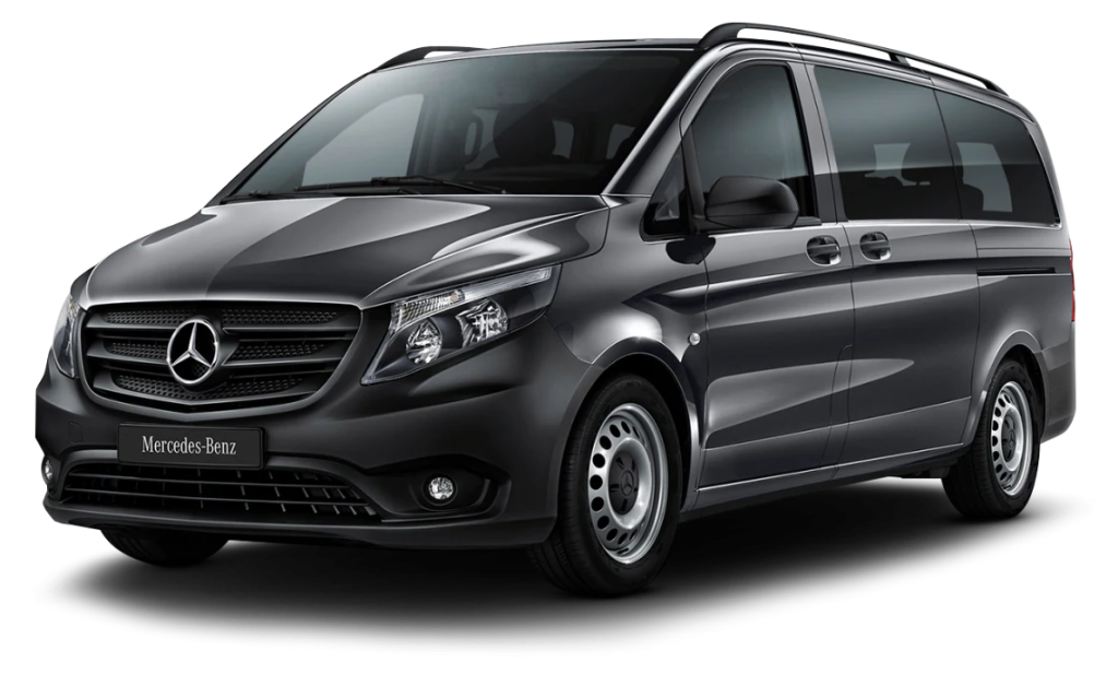 A black shiny 8 seater Mercedes